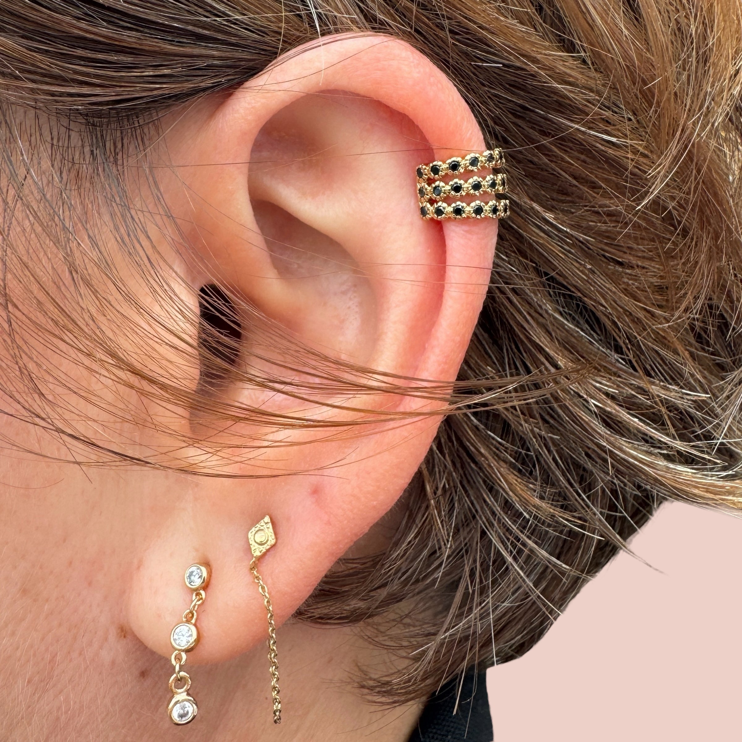 Faux piercing "3 anneaux noirs" plaqué or