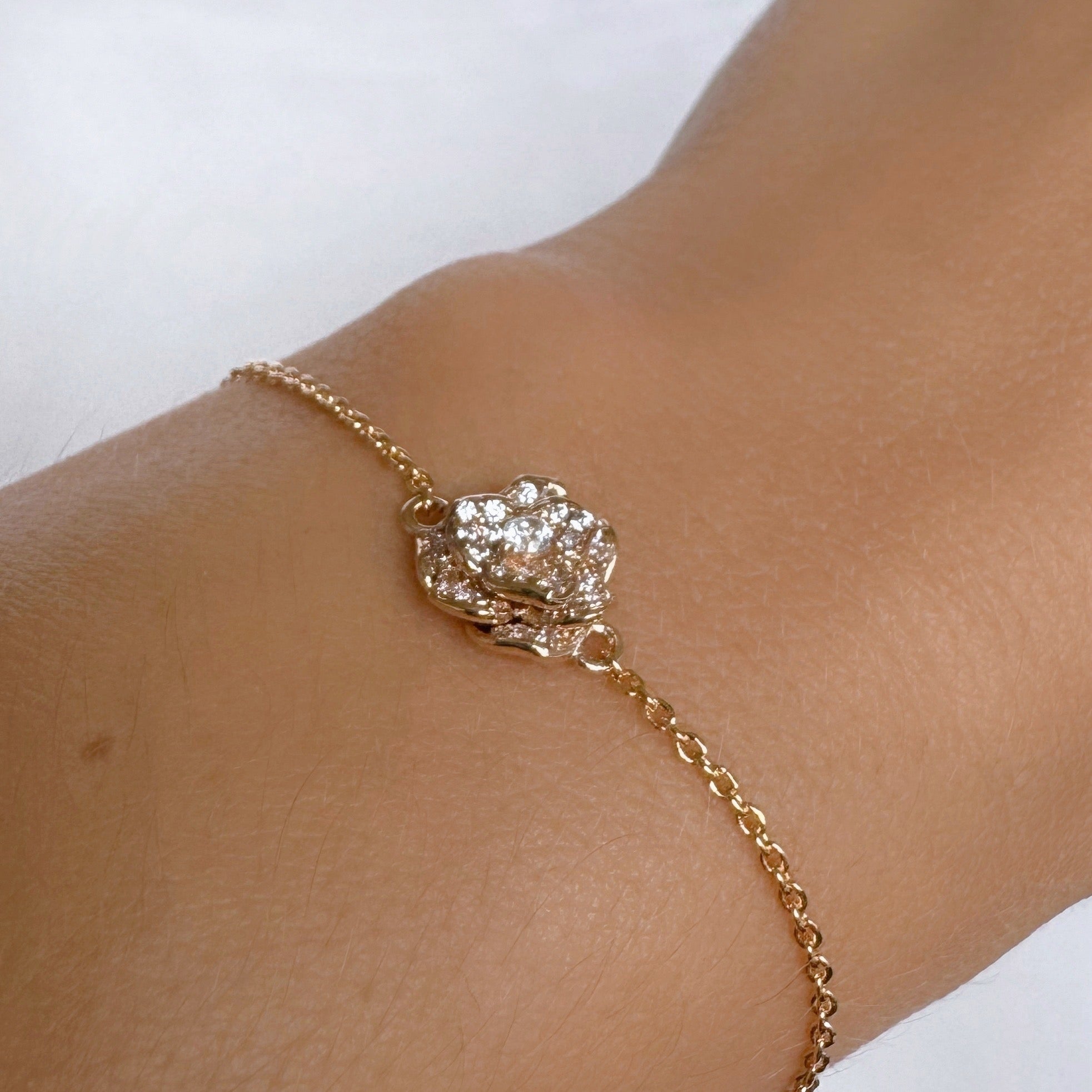 Bracelet « Rose sertie » plaqué or