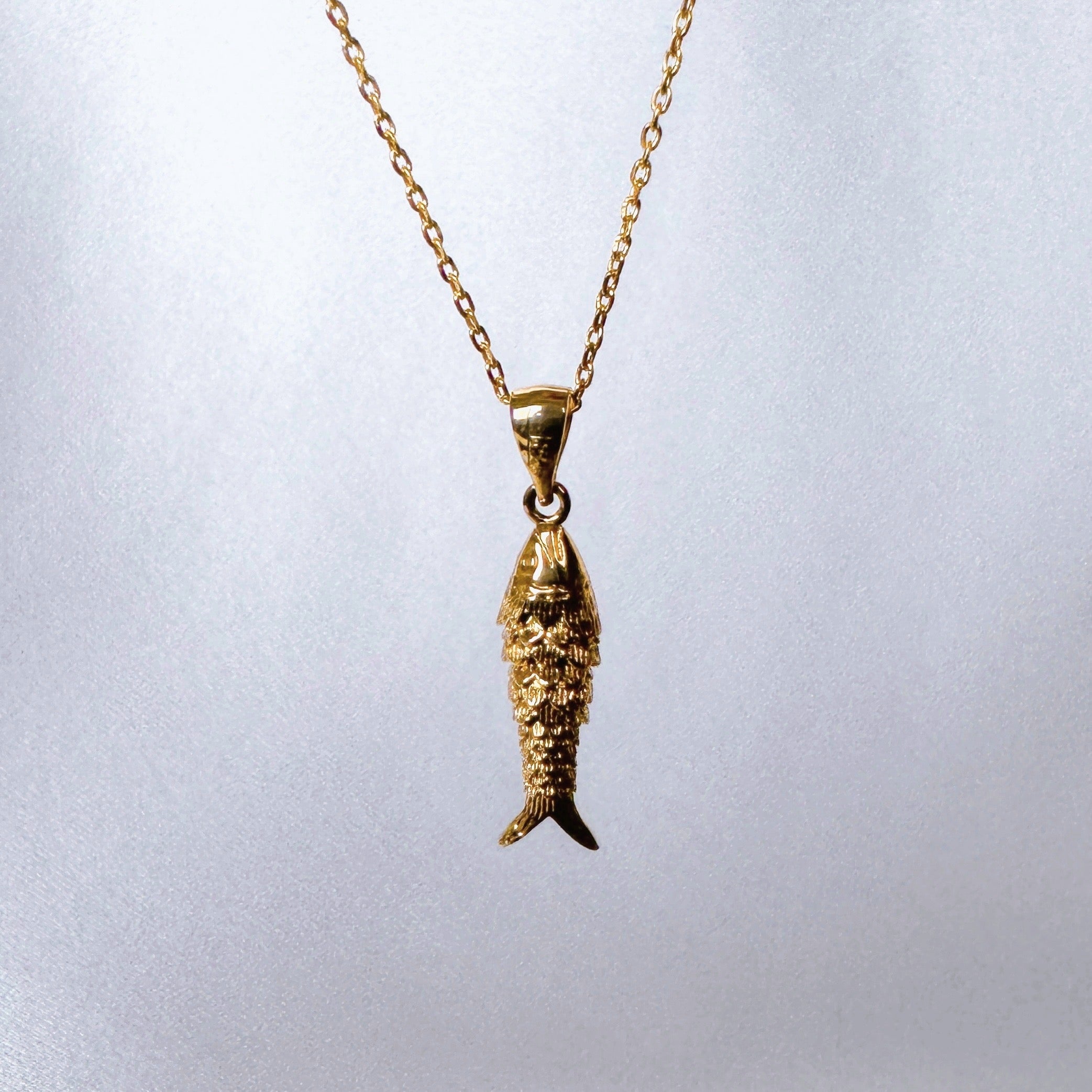 Gold-plated “Little articulated fish” necklace