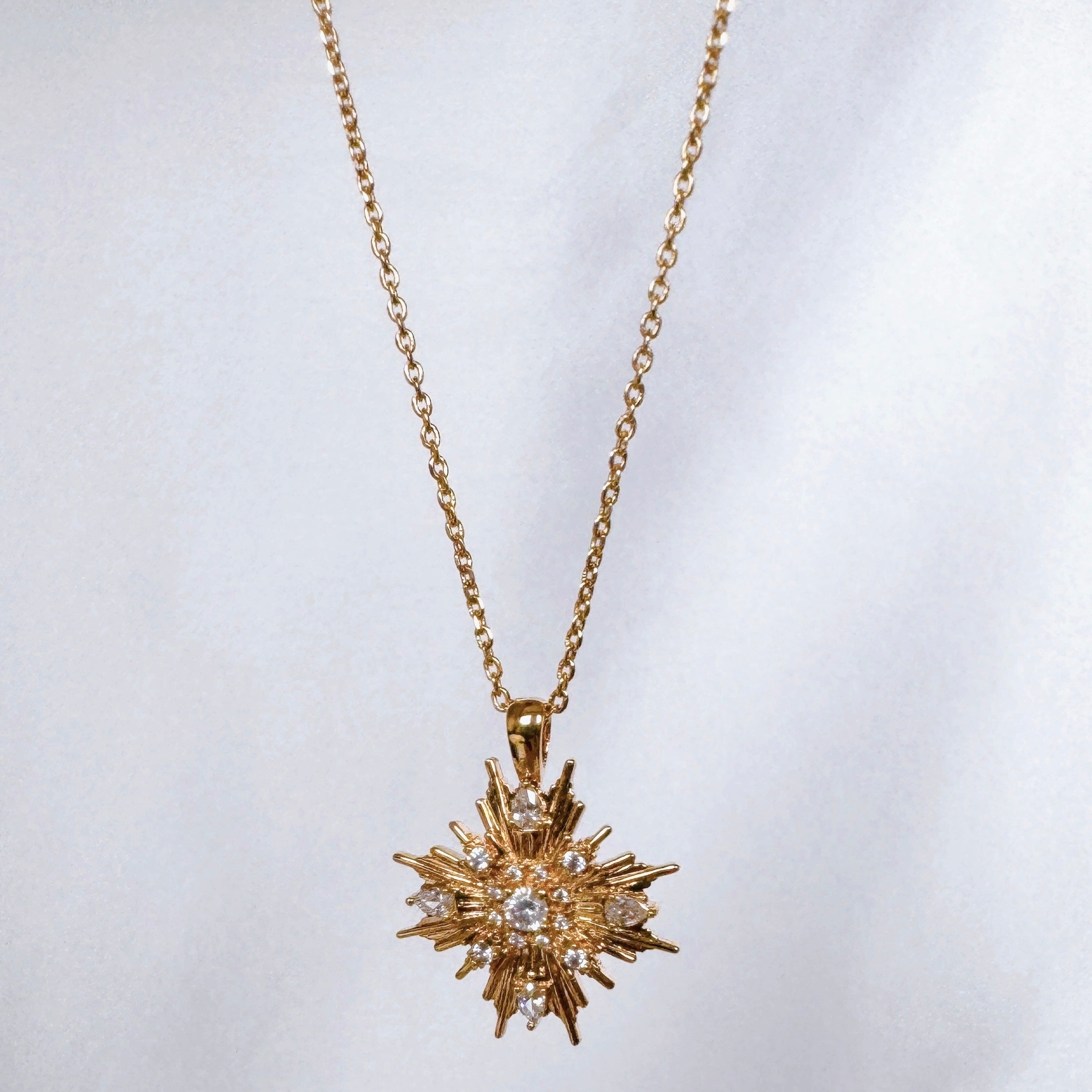 Gold-plated “Ray of light” necklace