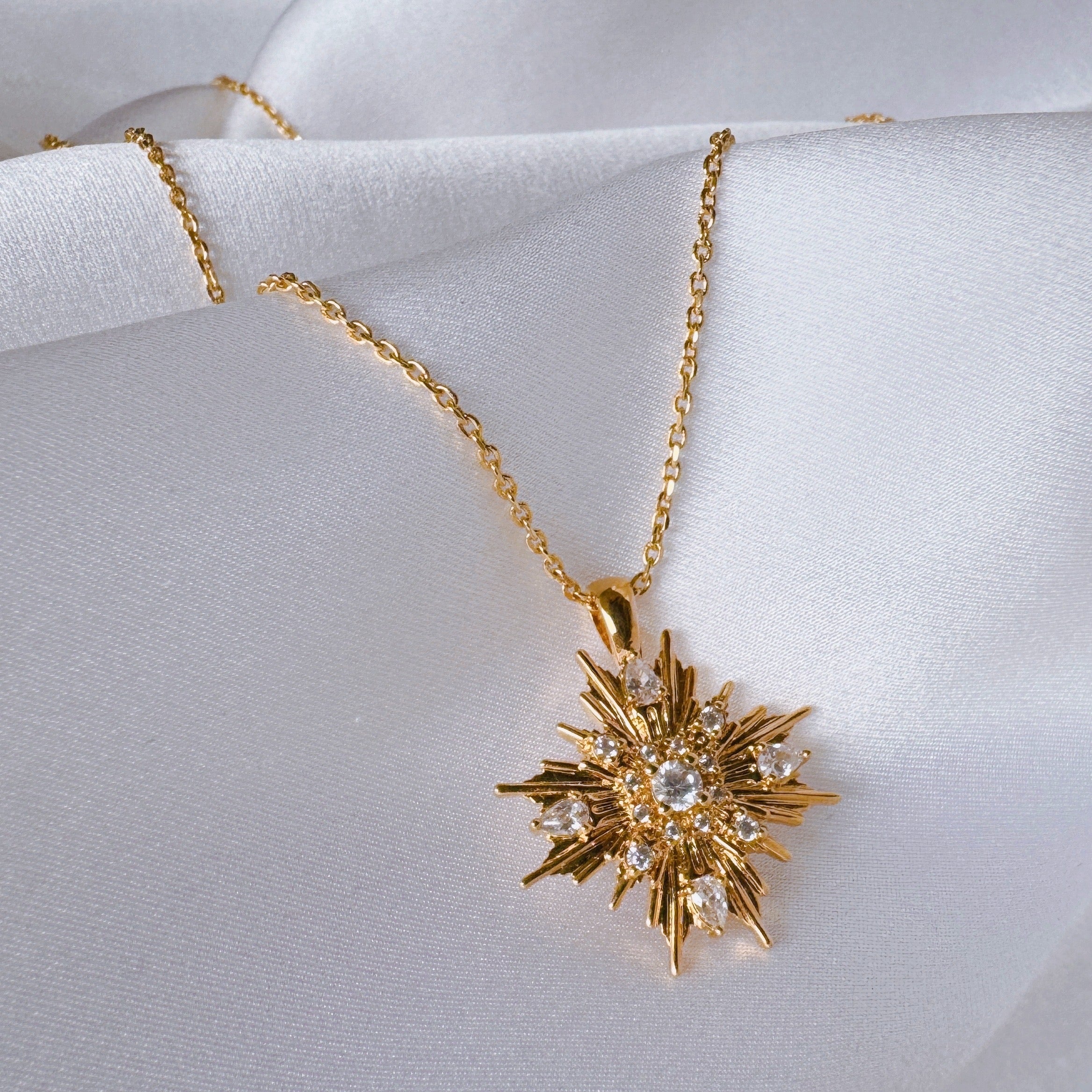 Gold-plated “Ray of light” necklace