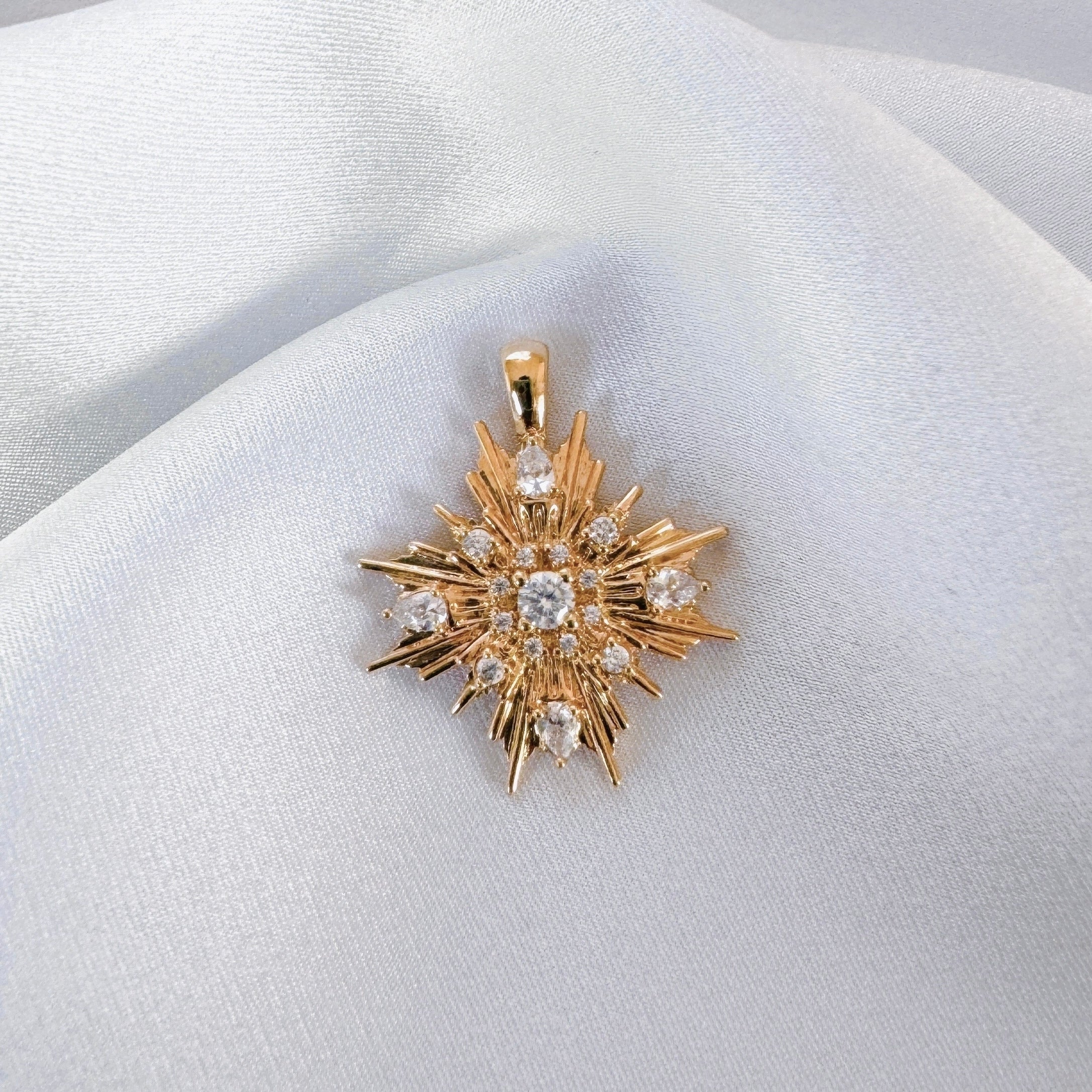 Gold-plated “Ray of light” pendant