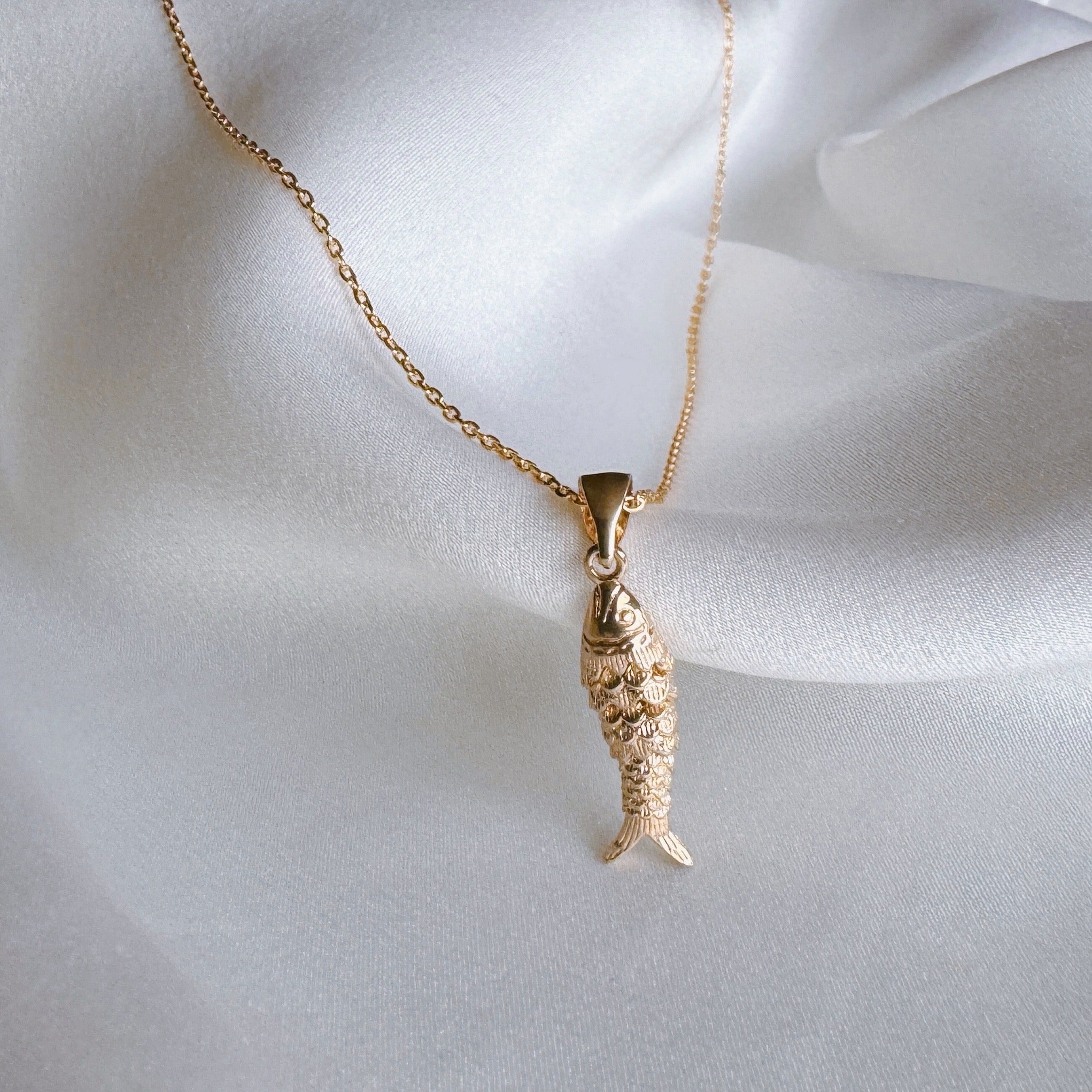 Gold-plated “articulated fish” necklace