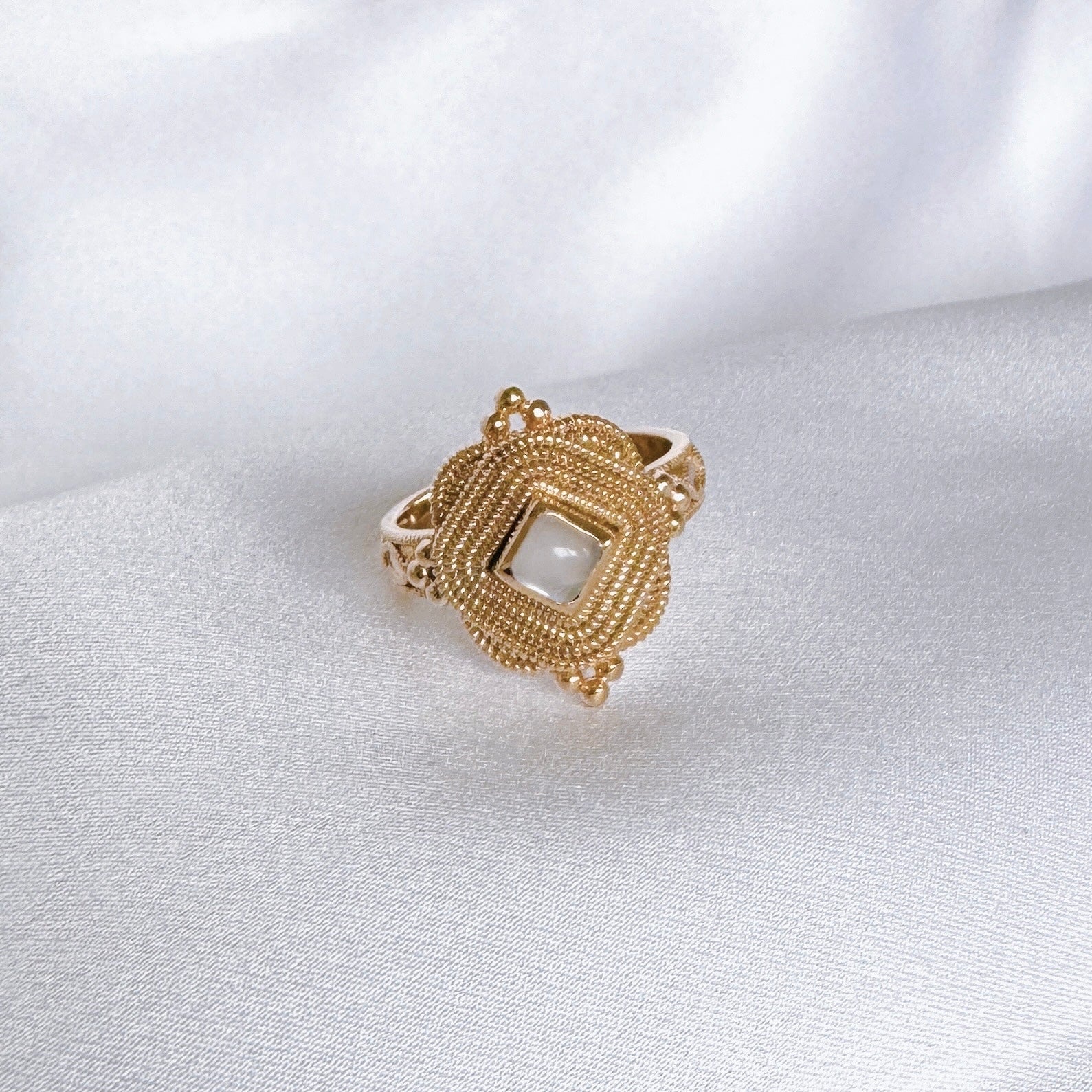 Gold-plated “Poetry” ring