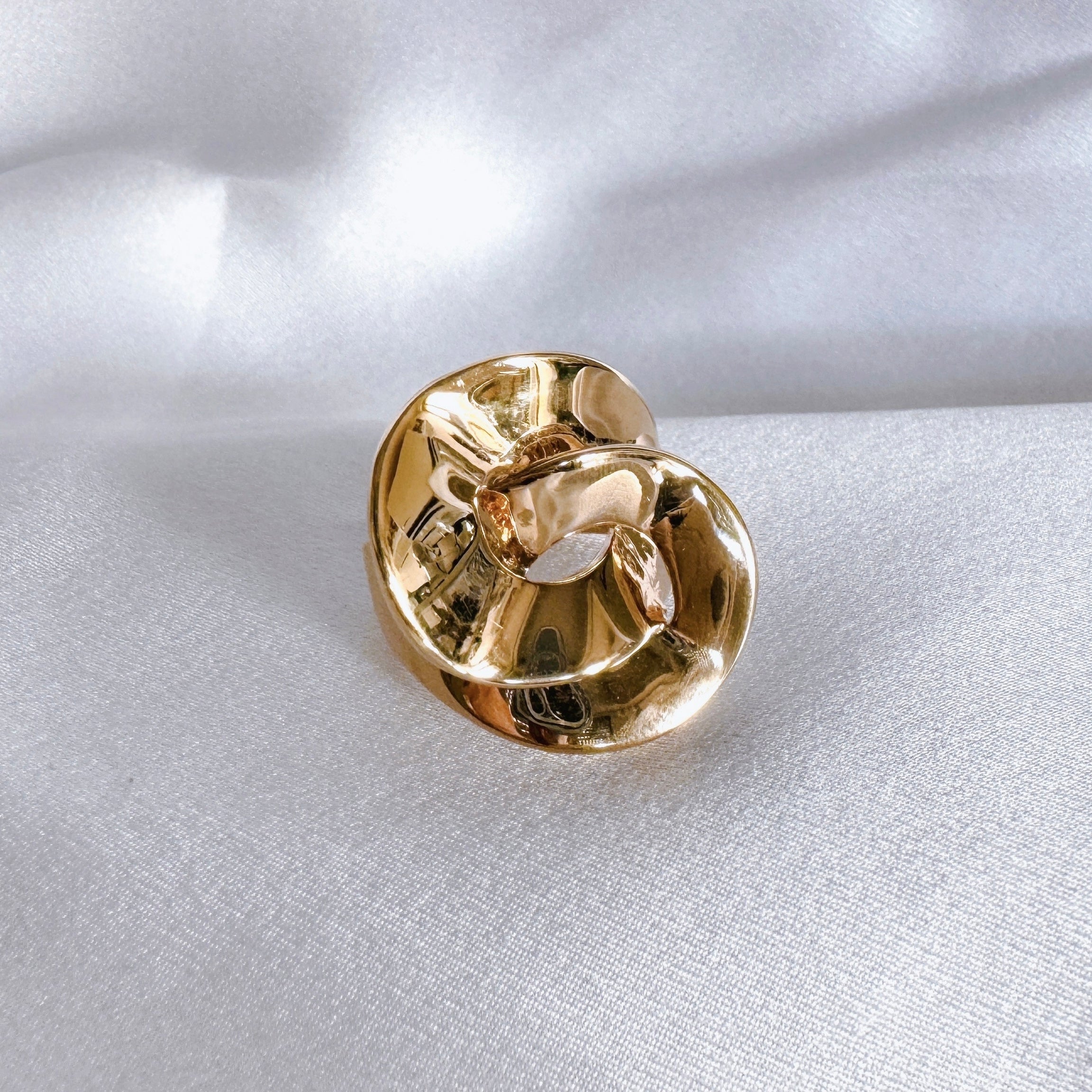 Gold-plated “Contemporary Interlaced” ring